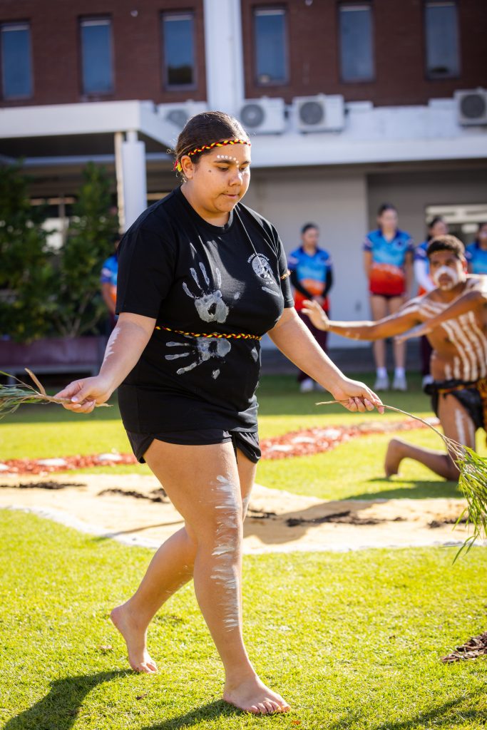 Our Indigenous students taking part in a traditional dance during our NAIDOC Assembly