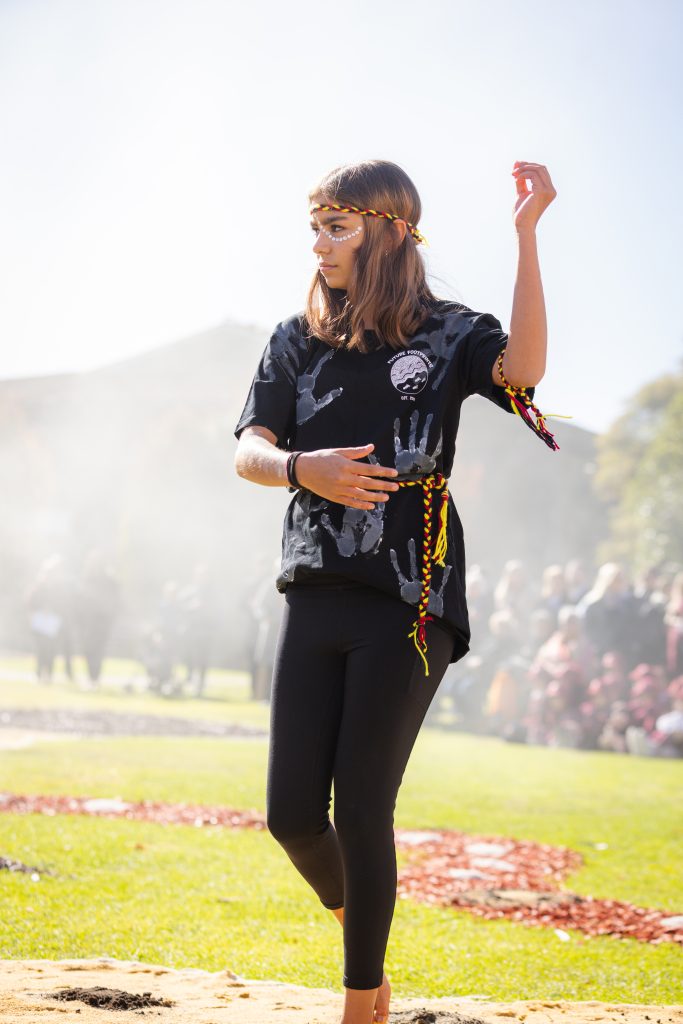 Our Indigenous students taking part in a traditional dance during our NAIDOC Assembly